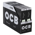 OCB Premium Slim rolling paper packaging with multiple packs displayed.